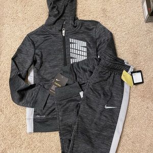 Nike tracksuit NWT Sz 7
